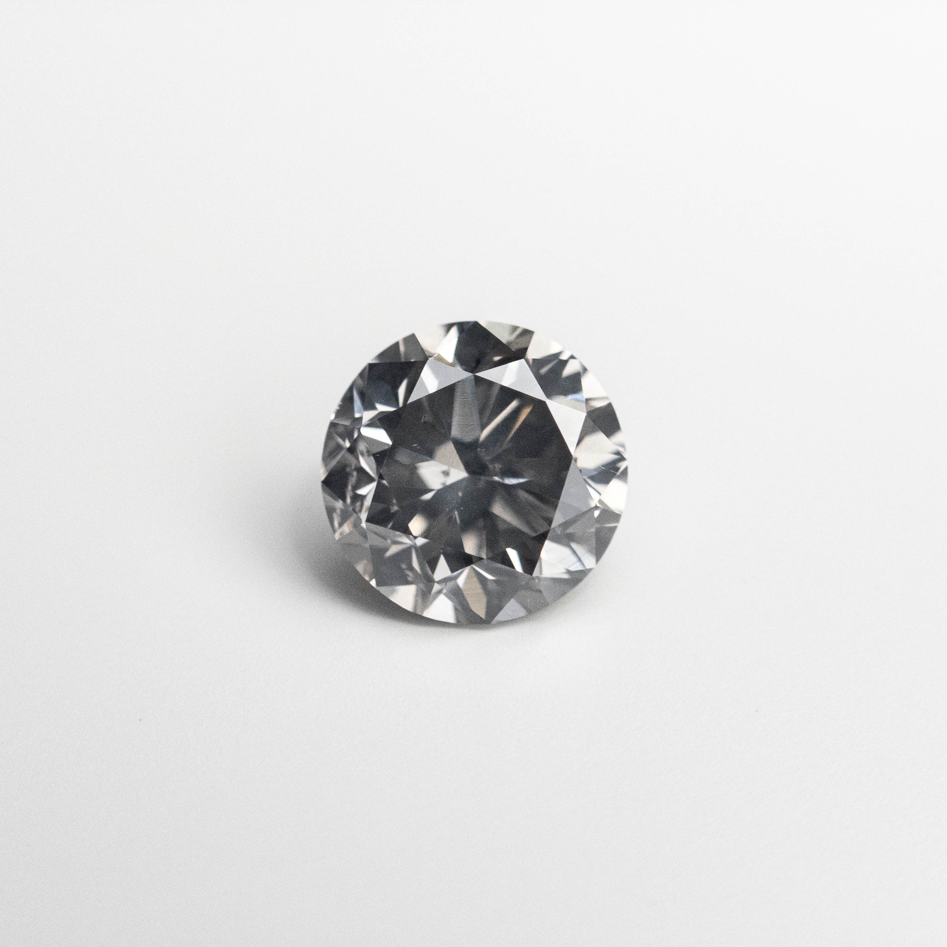 0.66ct 5.34-5.38x3.52mm Fancy Grey Round Brilliant 18968-10