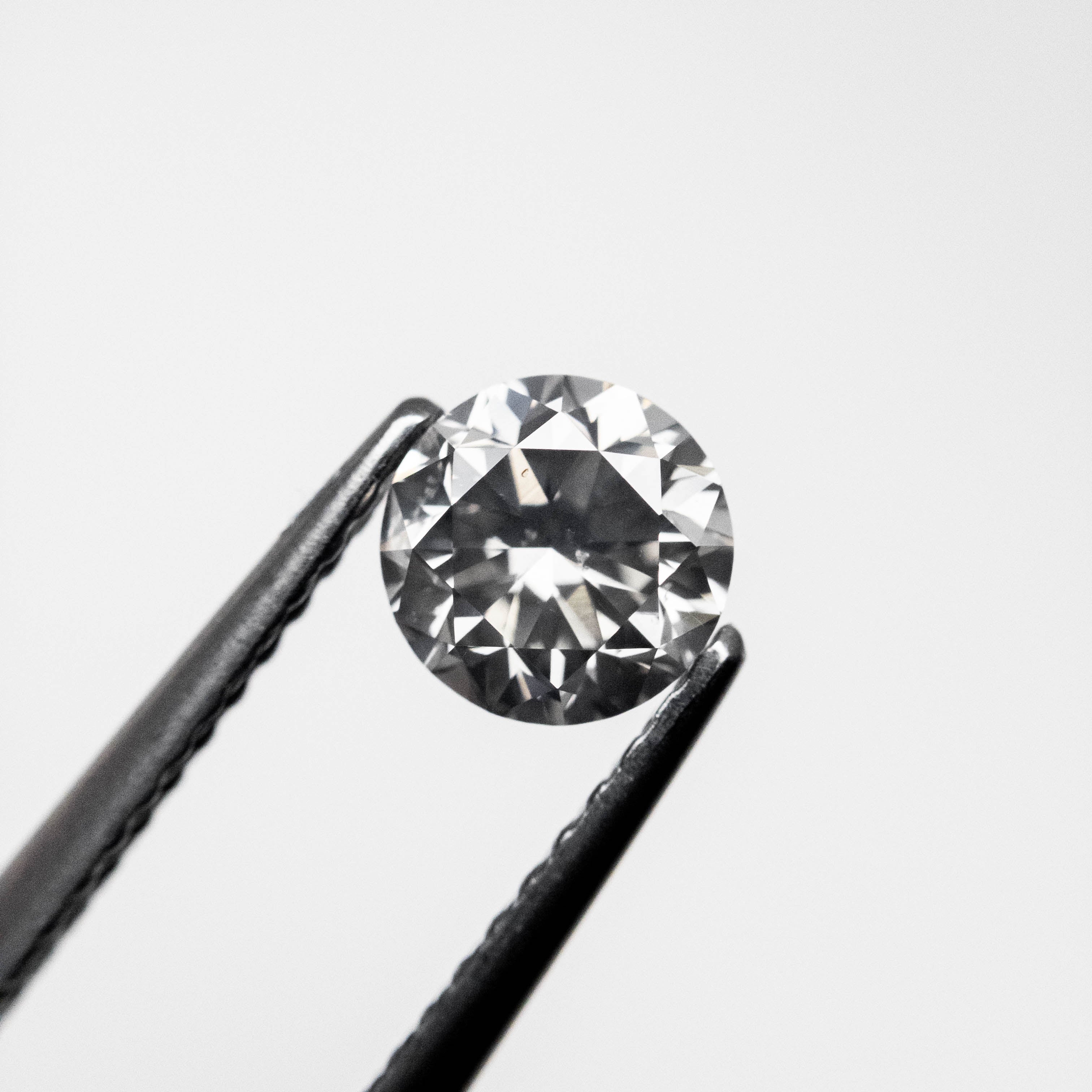 0.66ct 5.34-5.38x3.52mm Fancy Grey Round Brilliant 18968-10