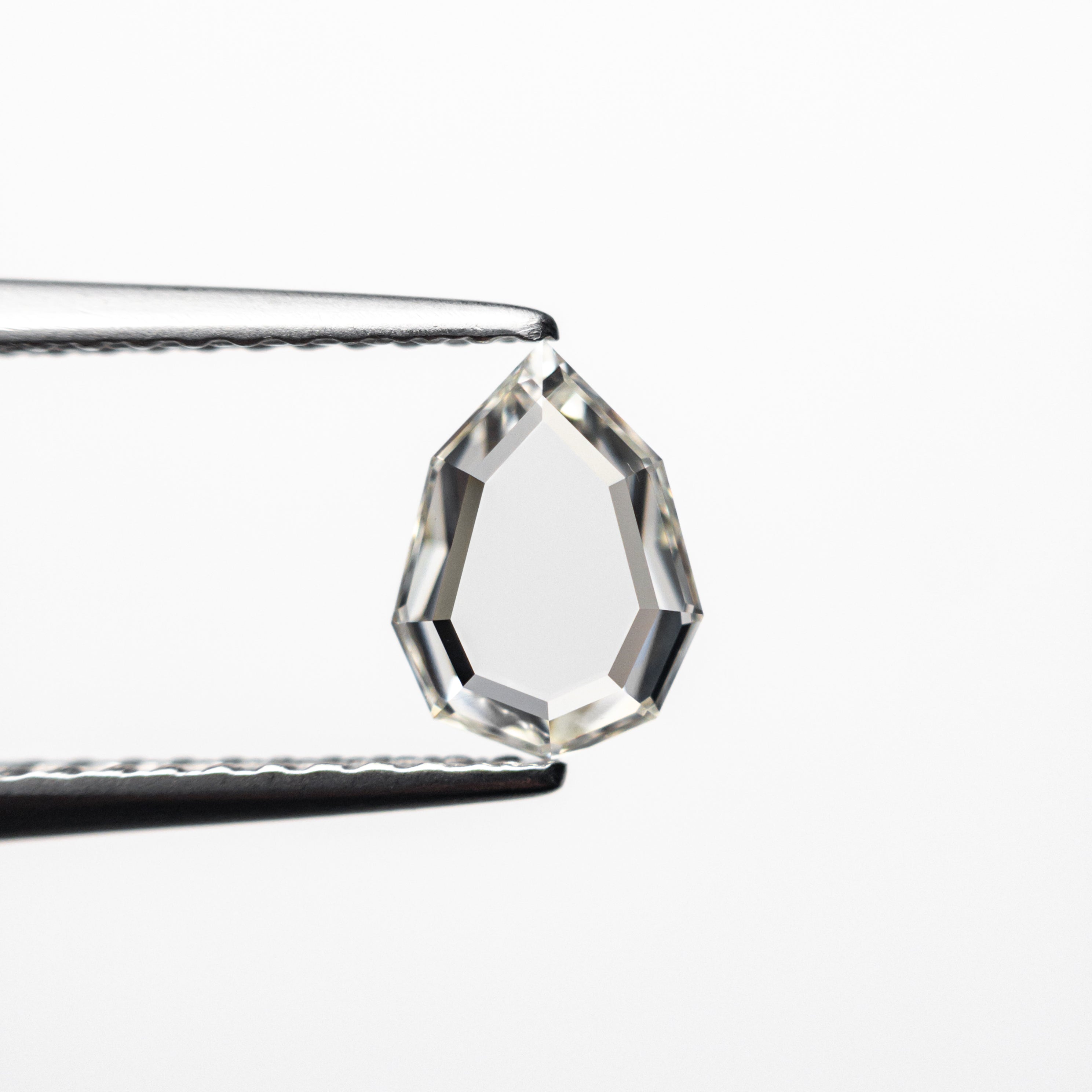 0.57ct 7.13x5.28x1.64mm VS1 J Geo Pear Portrait Cut 19854-53