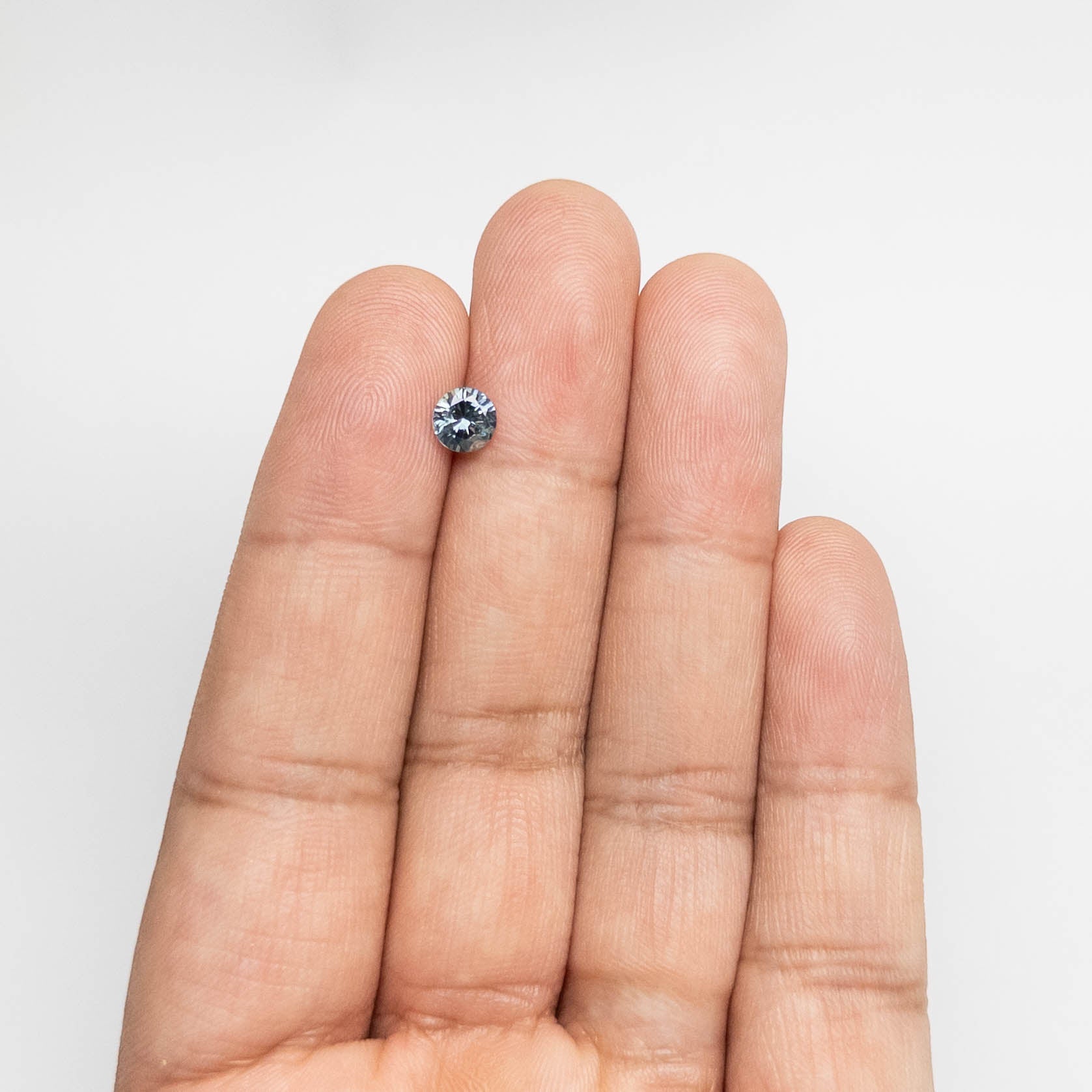 0.77ct 5.63x5.54x3.44mm Round Brilliant Sapphire 19942-32