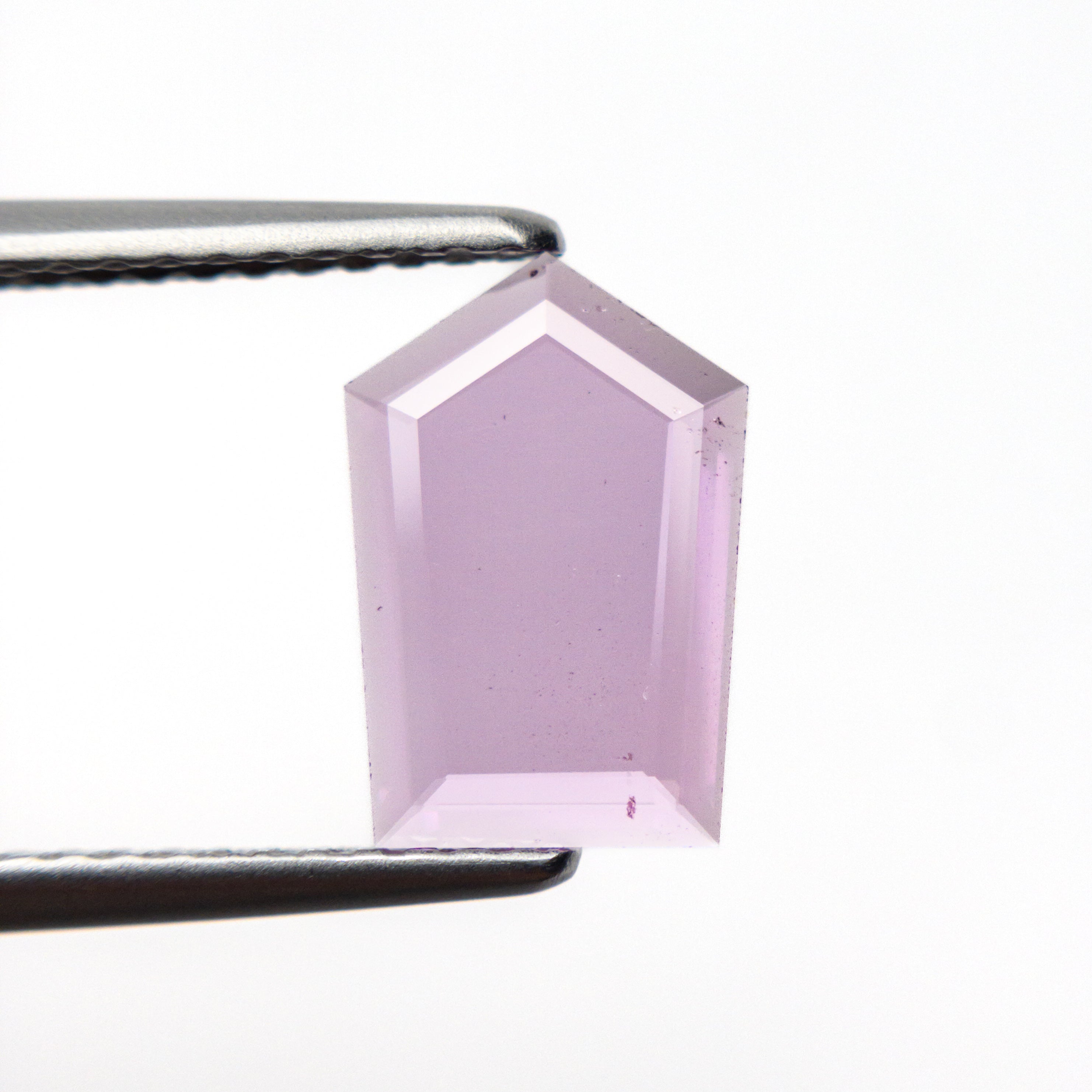 0.76ct 9.94x6.73x0.84mm Pentagon Portrait Cut Sapphire 22884-01