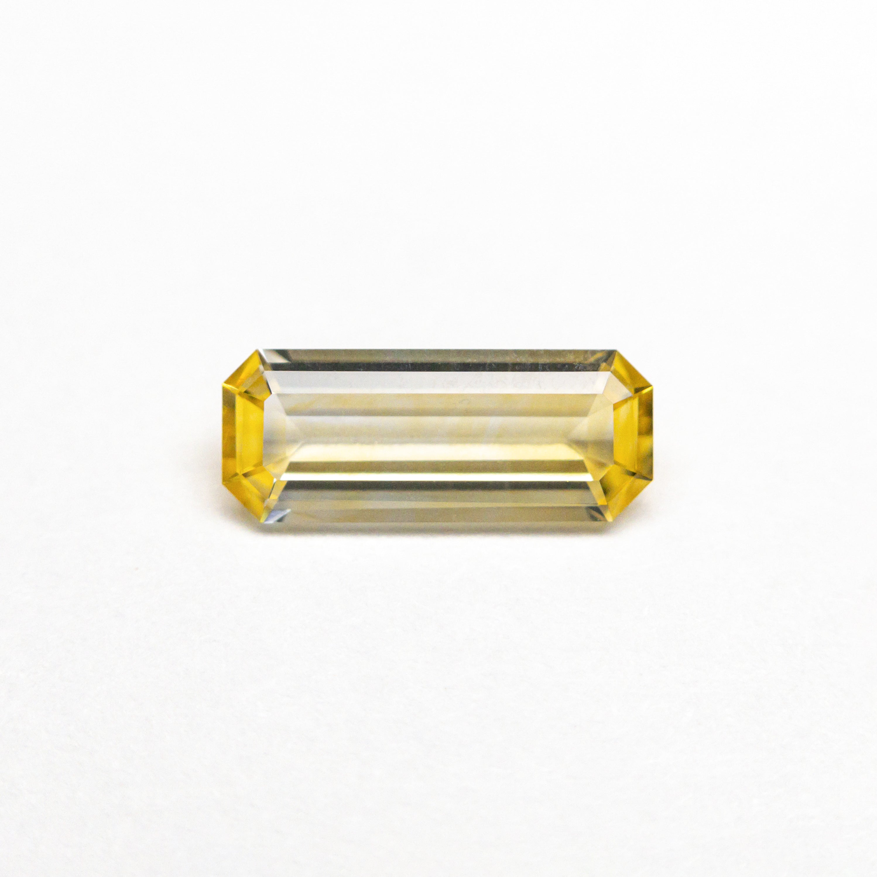 0.57ct 8.18x3.25x1.83mm Cut Corner Rectangle Step Cut Sapphire 23092-01