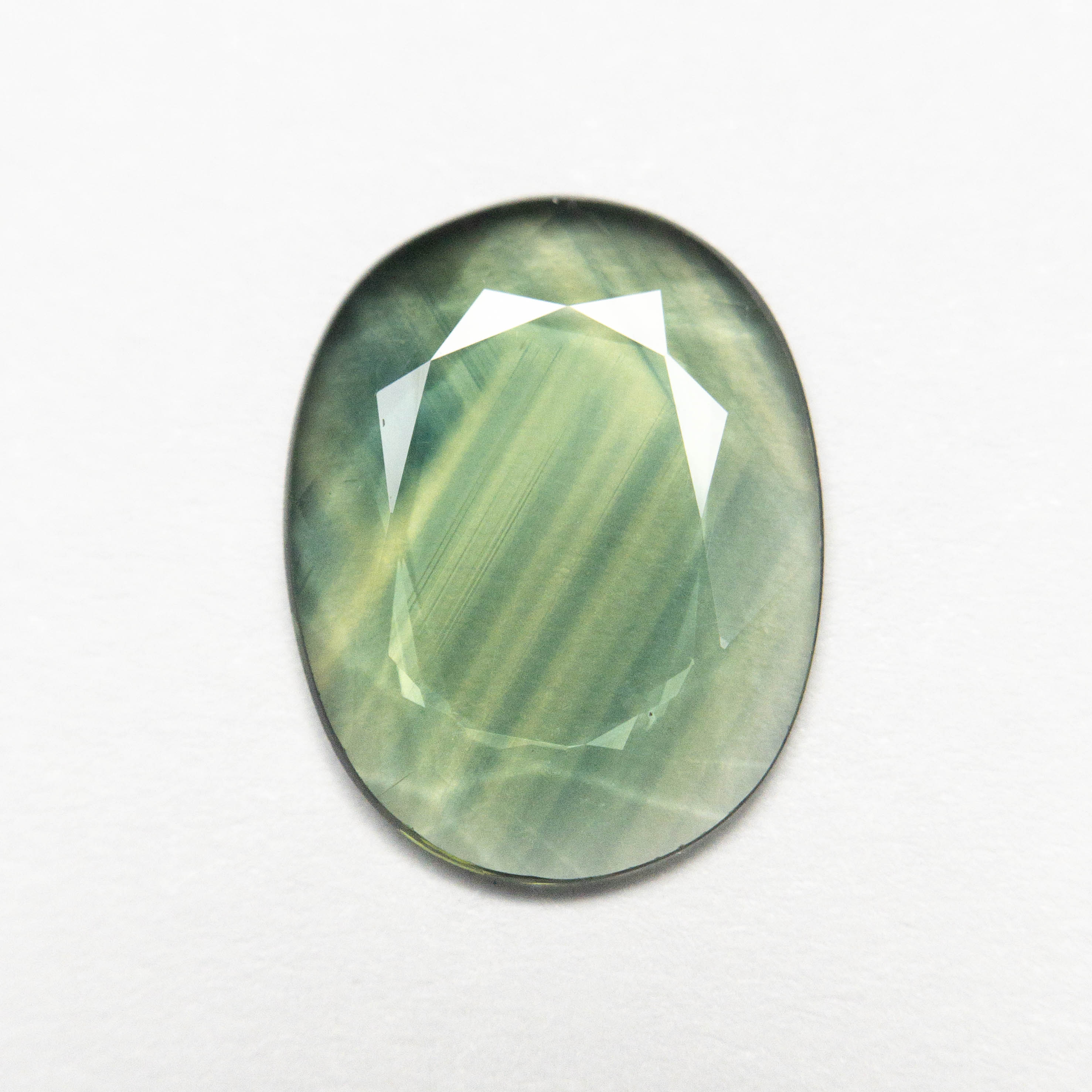 1.27ct 10.42x8.05x1.35mm Oval Portrait Cut Sapphire 23433-33