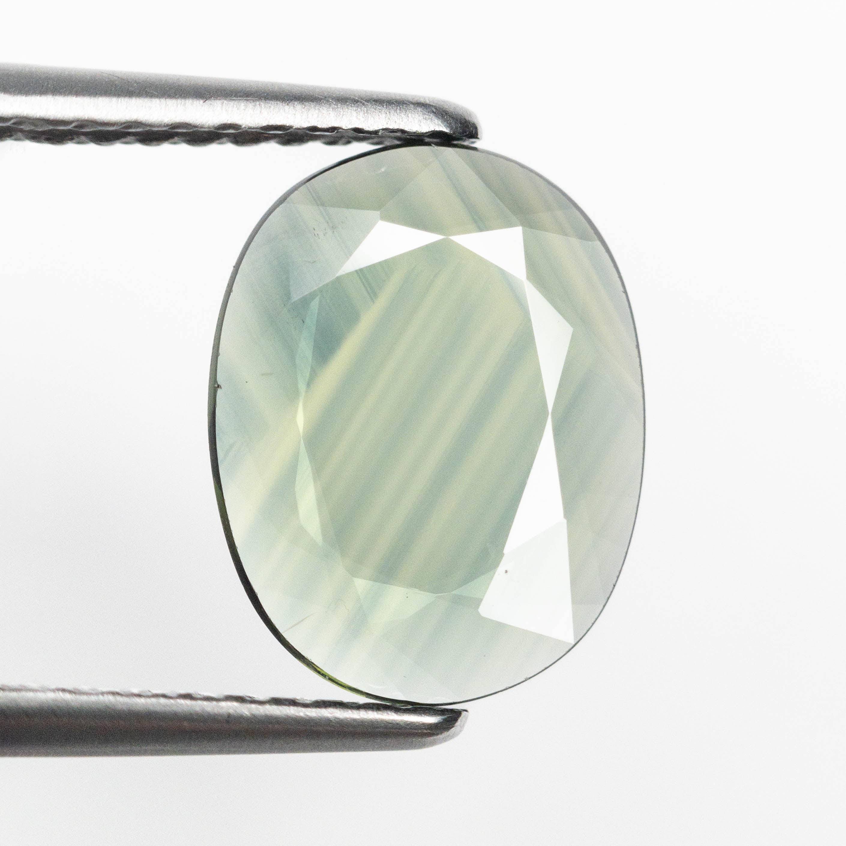 1.27ct 10.42x8.05x1.35mm Oval Portrait Cut Sapphire 23433-33