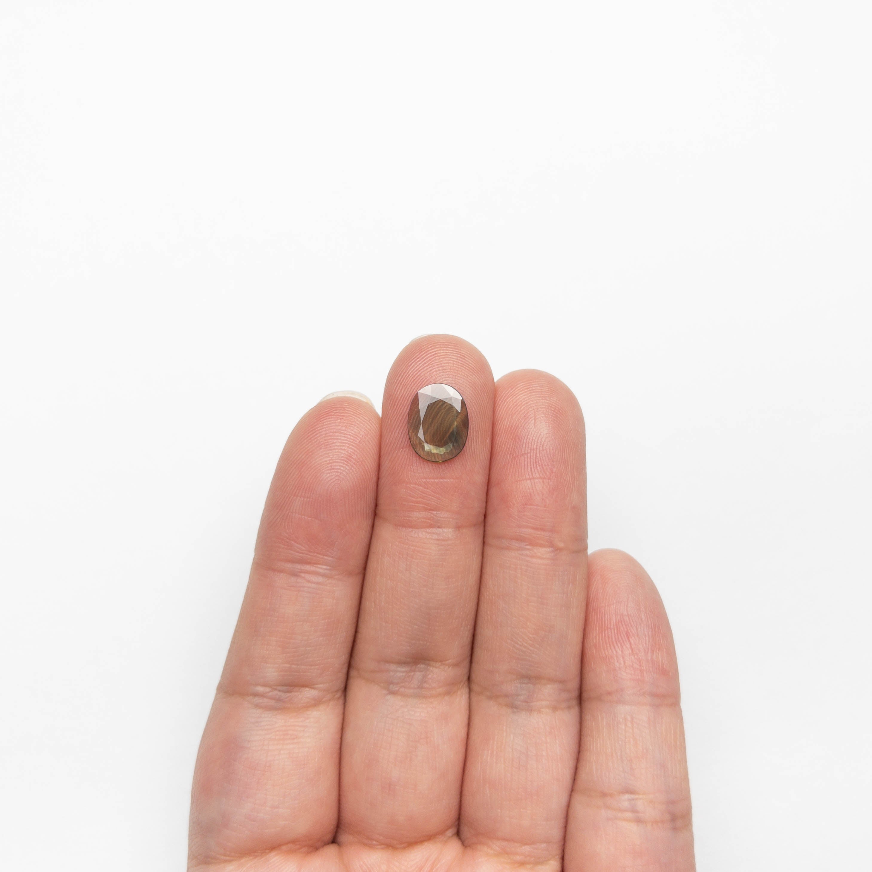 1.27ct 10.42x8.05x1.35mm Oval Portrait Cut Sapphire 23433-33