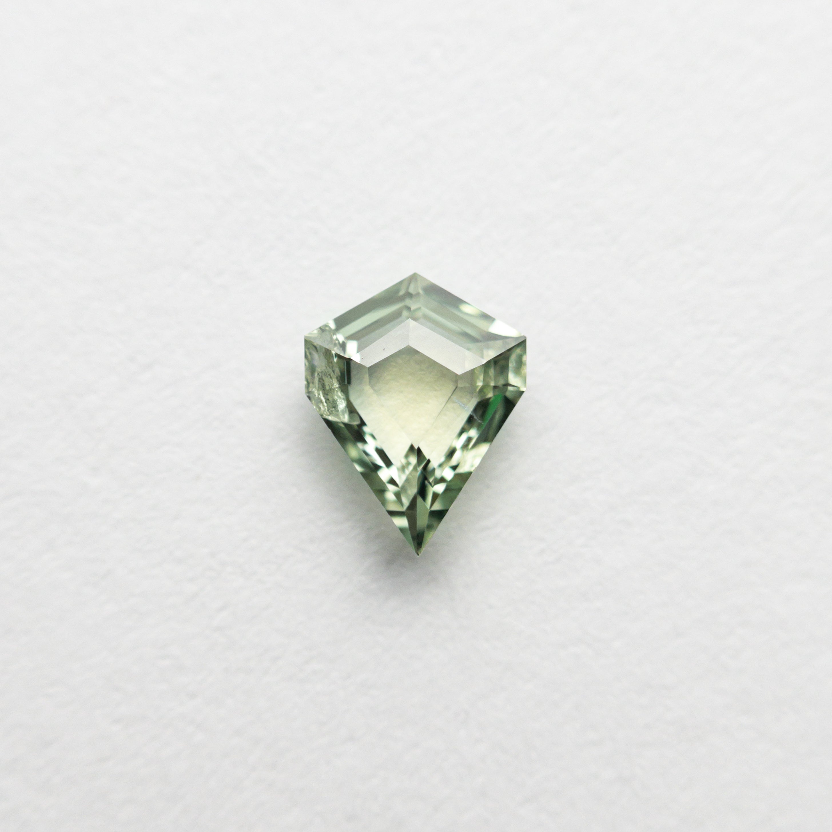 0.34ct 5.51x4.30x2.11mm Shield Portrait Cut Sapphire 23474-19