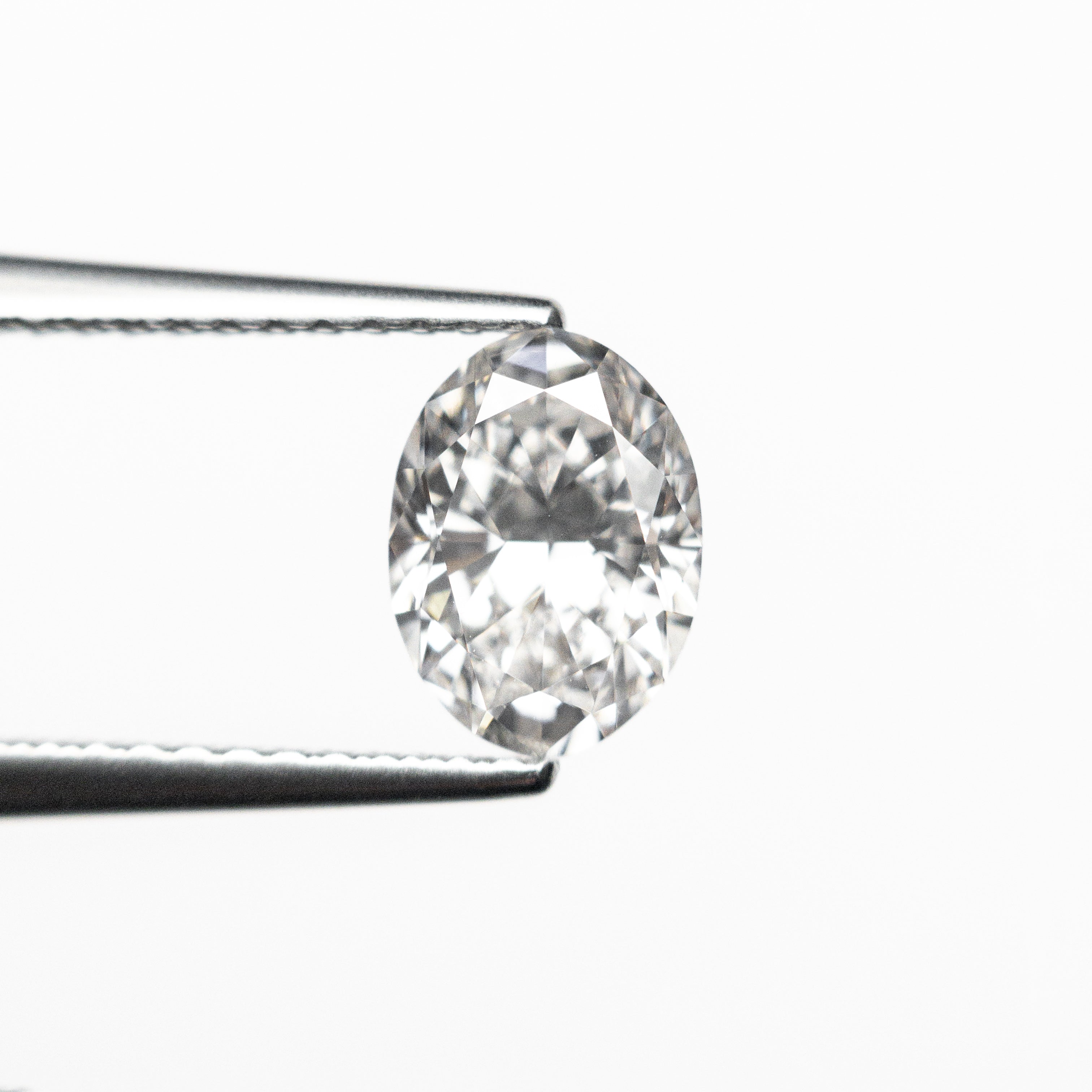 0.99ct 7.60x5.57x3.45mm VVS1 F Oval Brilliant 🇨🇦 26120-18