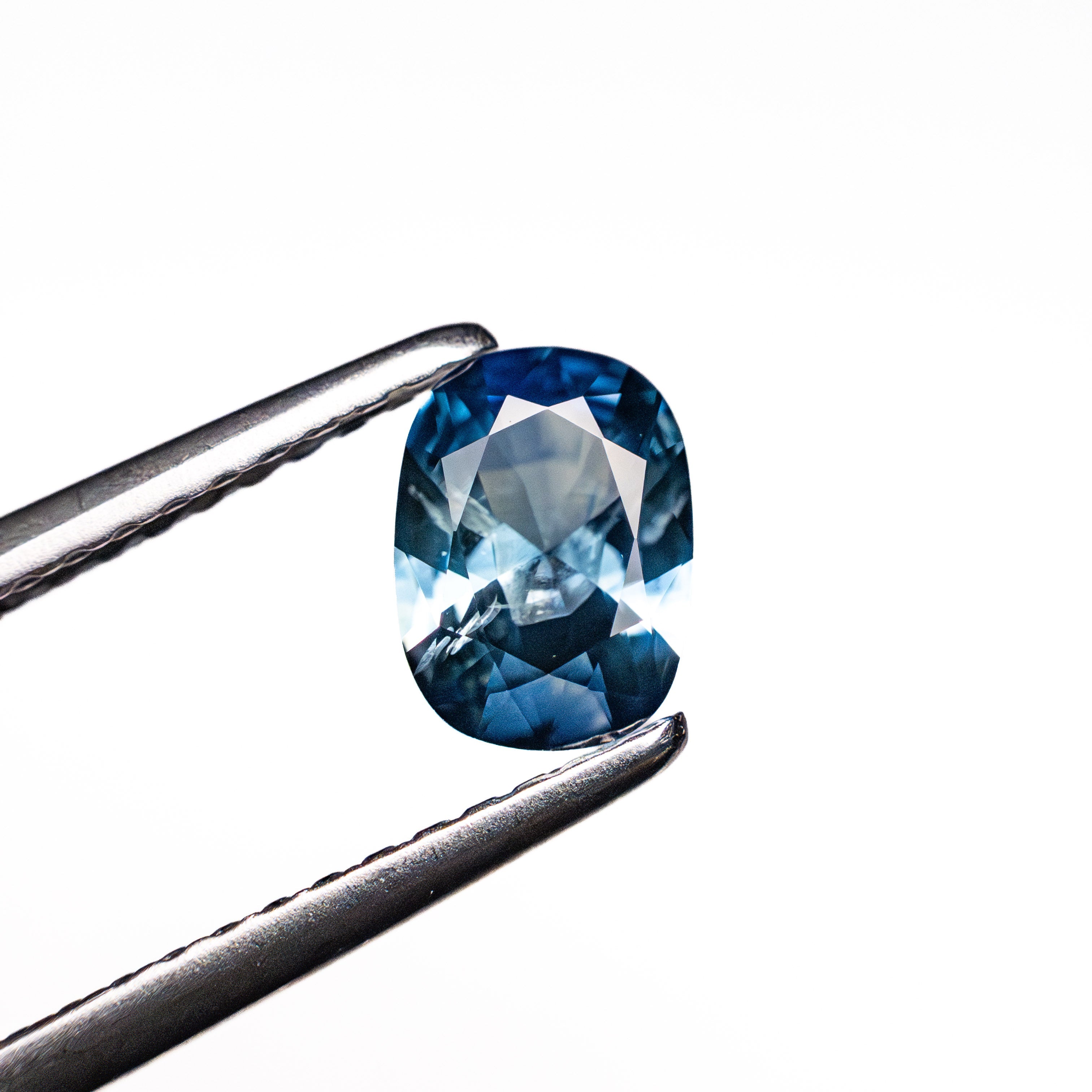 0.64ct 6.32x4.62x2.69mm Cushion Brilliant Sapphire 26673-11