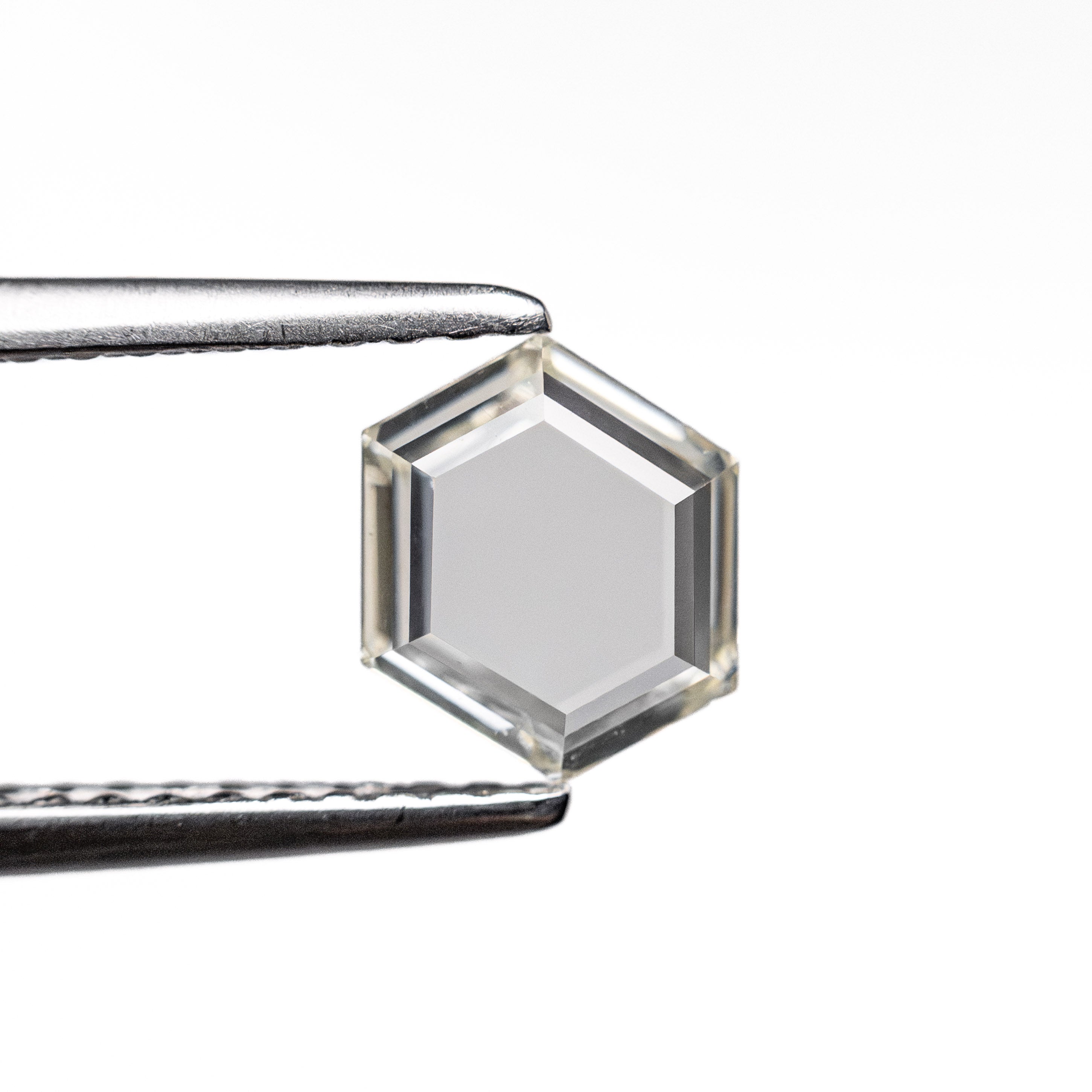 0.71ct 6.15x6.43x1.79mm VVS2 K Hexagon Portrait Cut 27067-01