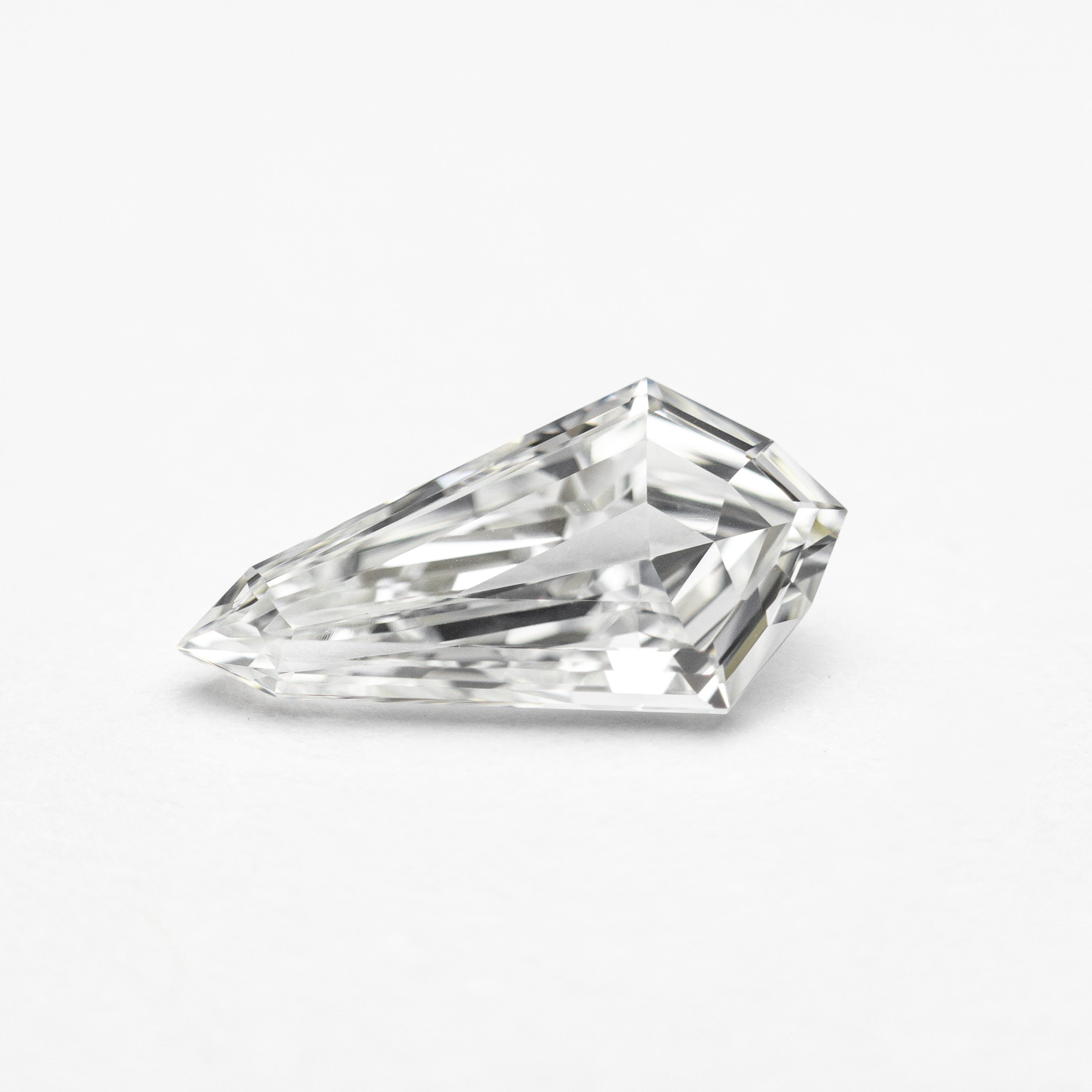 0.71ct 10.00x5.18x2.29mm VS1 F Kite Step Cut 21690-06