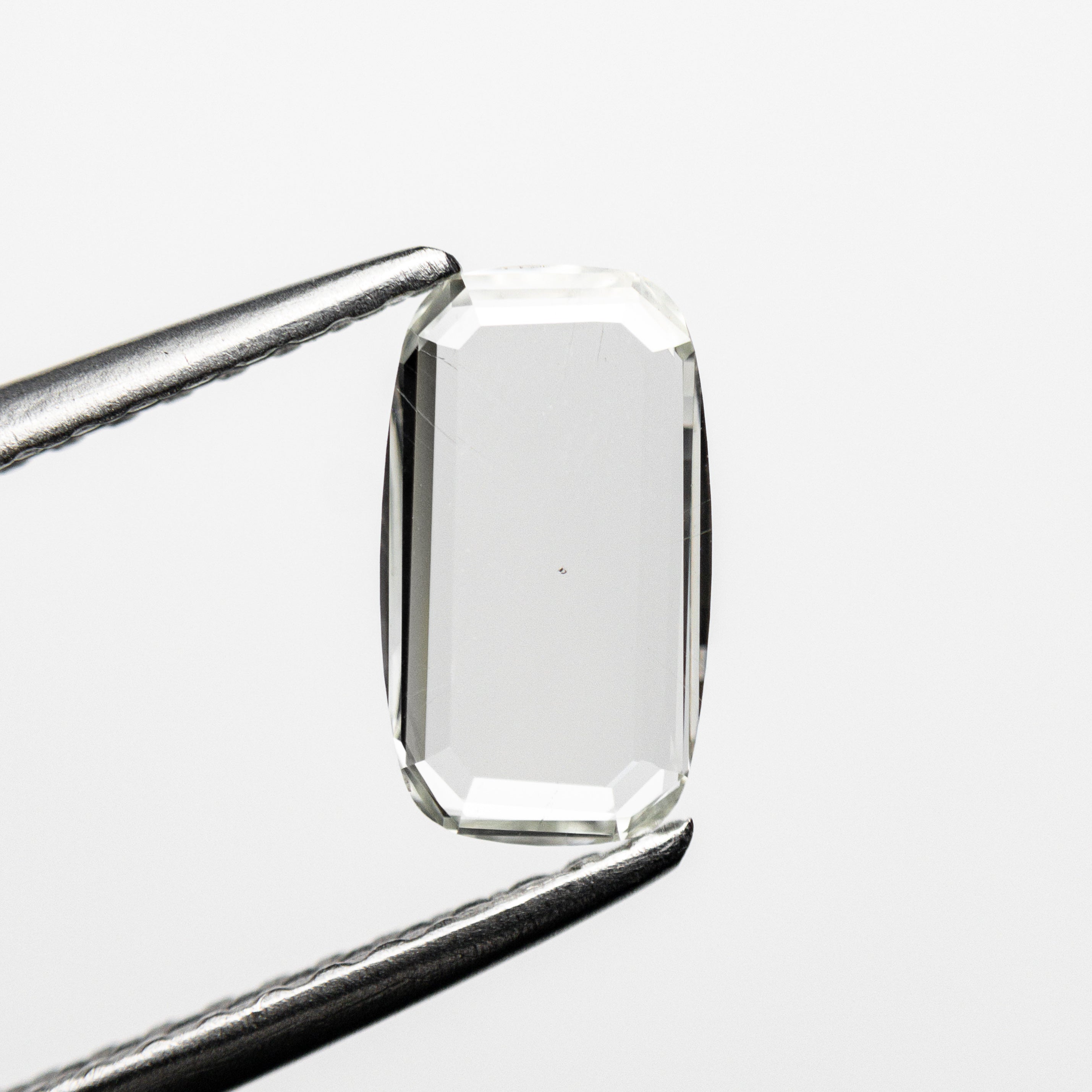 0.69ct 8.21x4.68x1.32mm SI2 L Cushion Portrait Cut 22357-01