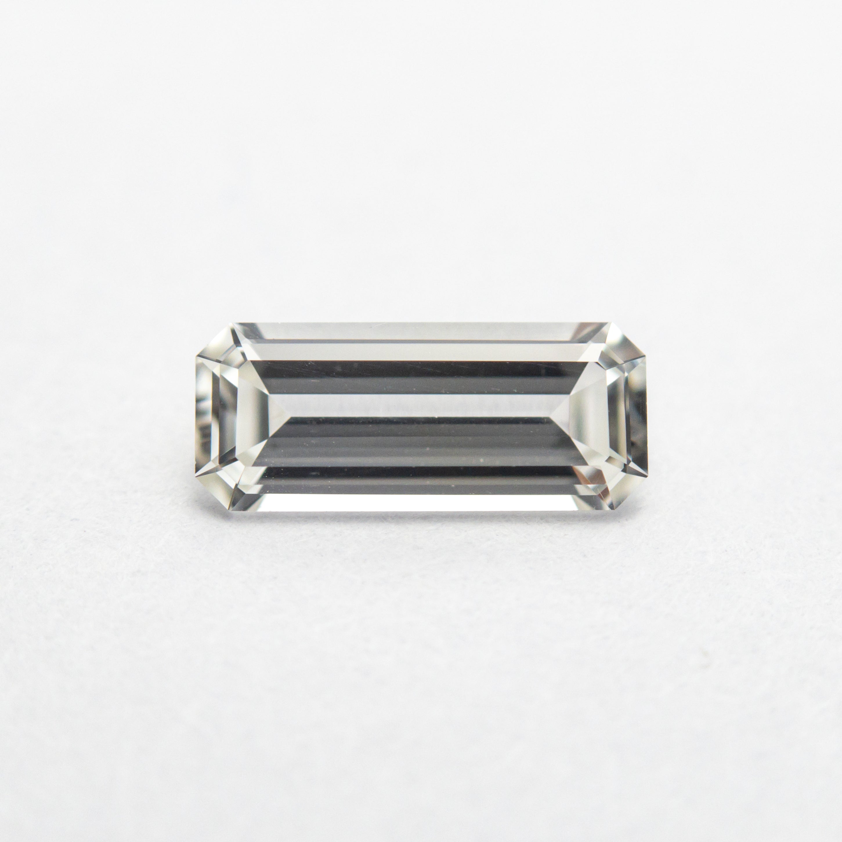 0.71ct 8.30x3.48x2.21mm Cut Corner Rectangle Step Cut Sapphire 22830-01